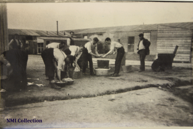 Washing clothes at Rath Internment Camp (NMI Collection) 